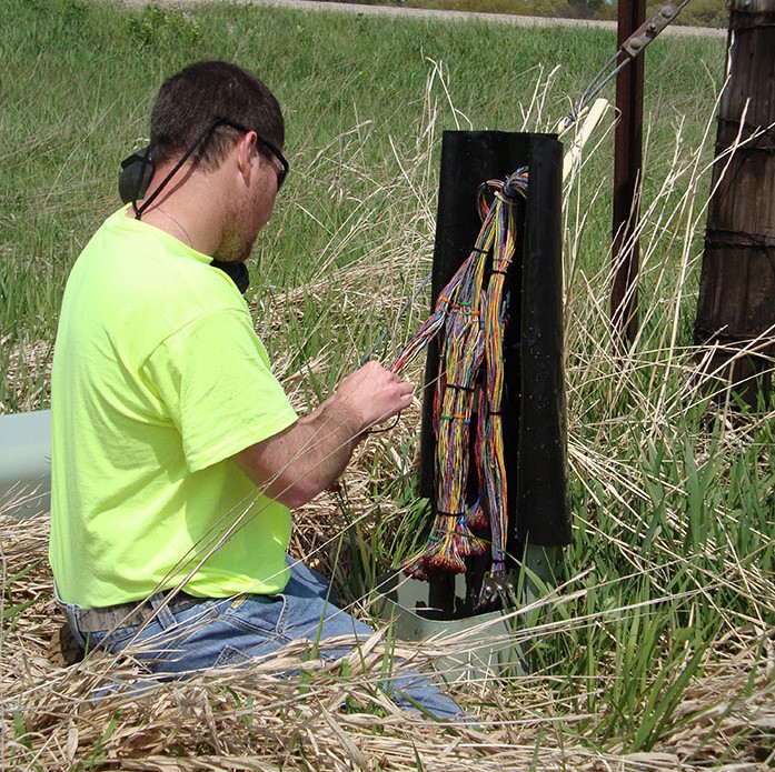 central cable worker organizes cable wires