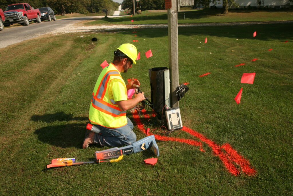 central cable worker setting up a cable box