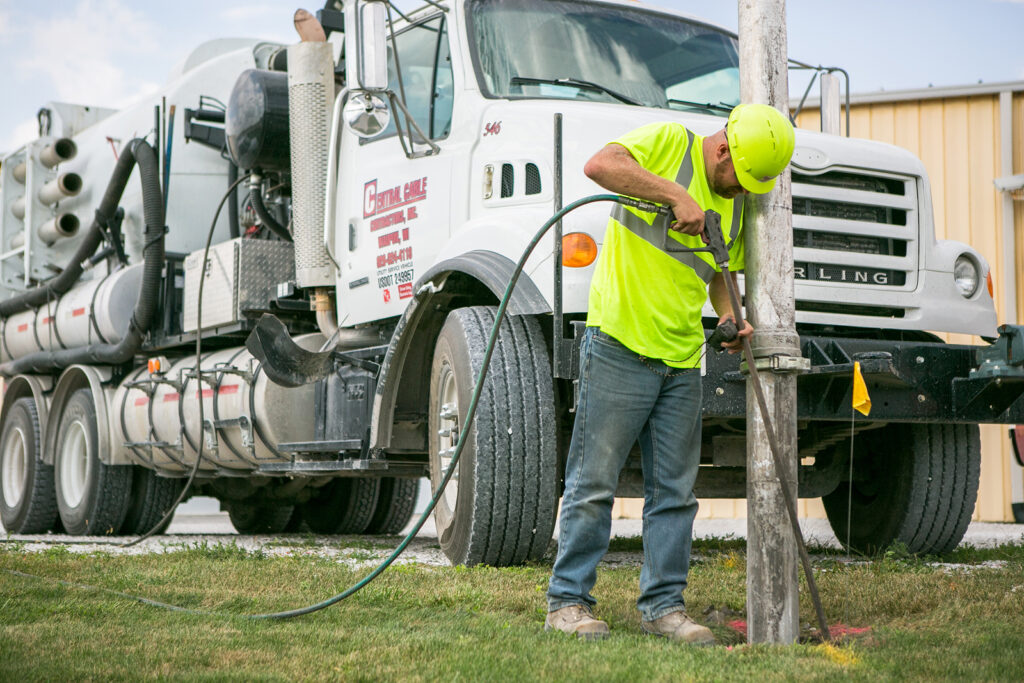 central cable worker looking for cable site