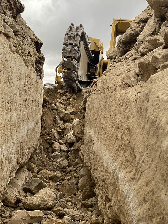 central cable worker cutting concrete