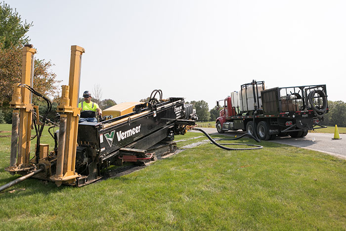 Central Cable worker driving a Vermeer machine