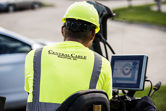central cable worker monitoring cable placements