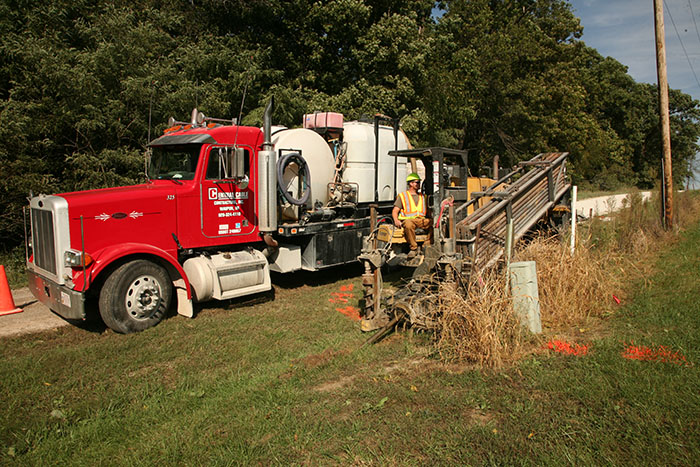 Central Cable worker driving a Vermeer machine